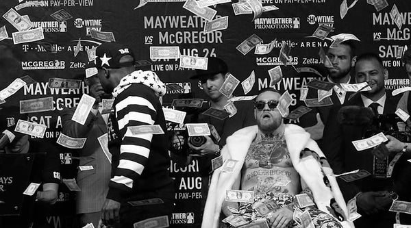 Mayweather throwing money on McGregor